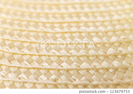 Close-up texture of woven straw material in soft light Close-up texture of woven straw material in soft light 123679755
