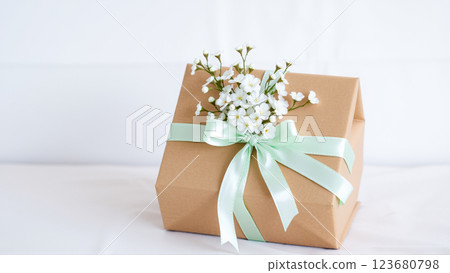 Young girl with bright face makeup on pink background. Girl dressed in a vintage sports windbreaker Young girl with bright face makeup on pink background. Girl dressed in a vintage sports windbreaker 123680798