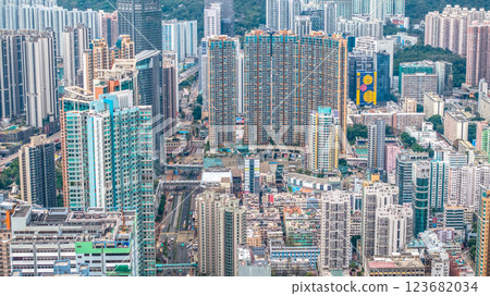 Feb 23 2025 Urban Skyscrapers Surrounding Colorful Recreational Sports Fields 123682034