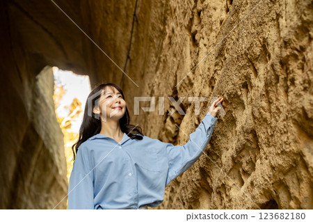 A woman travelling through the Torozaka Daishi tunnel A woman travelling through the Torozaka Daishi tunnel 123682180