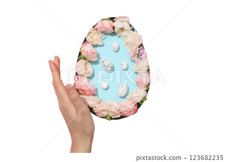 PNG, Easter, cut out egg shape, with pink flowers, on a blue background, isolated on a white background PNG, Easter, cut out egg shape, with pink flowers, on a blue background, isolated on a white background 123682235