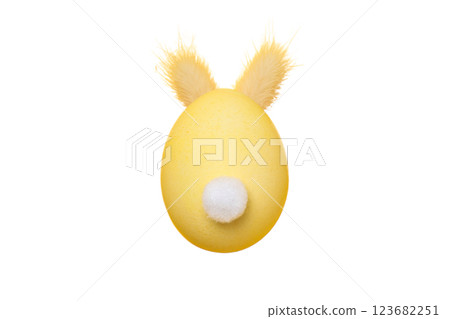 PNG, Easter, yellow egg with rabbit tail and ears, isolated on white background 123682251