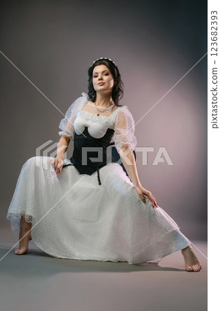Elegant woman in corset and lingerie showcasing beauty and fashion trends Elegant woman in corset and lingerie showcasing beauty and fashion trends 123682393