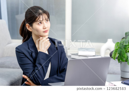 Troubled, surprised, worried, laptop, business woman portrait Troubled, surprised, worried, laptop, business woman portrait 123682583