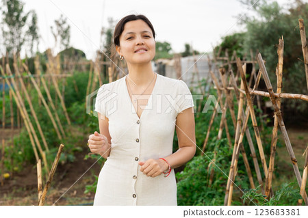 Asian woman at vegetable garden 123683381