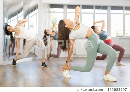 Group of women dancing dancehall in studio Group of women dancing dancehall in studio 123683397