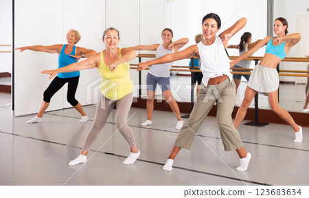 Various aged women dancing modern dance Various aged women dancing modern dance 123683634