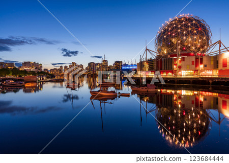 Urban city night, Vancouver marina twilight panoramic view. Skyline and buildings lights reflection on False Creek water. British Columbia, Canada. Science World. 123684444