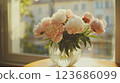 Freshly cut peonies arranged in a luxurious bouquet , flower arrangement, wedding decoration, high end. 123686099