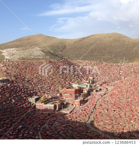 Larung Gar Gompa, the crimson city in the sky Larung Gar Gompa, the crimson city in the sky 123686453