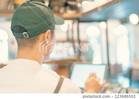 Image of a store that has implemented electronic payment (no face) 123686501