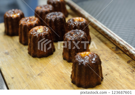 Freshly baked canelé 123687601