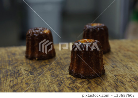 Freshly baked canelé 123687602