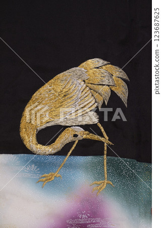 Crane embroidery in gold and silver threads and blue and white pattern Crane embroidery Crane embroidery in gold and silver threads and blue and white pattern Crane embroidery 123687625