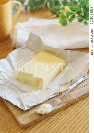 Butter wrapped in paper 123688084