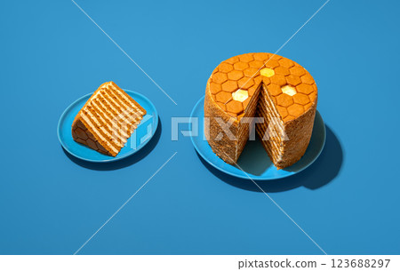 Medovik, honey layered cake, russian recipe, in bright light on a blue table 123688297