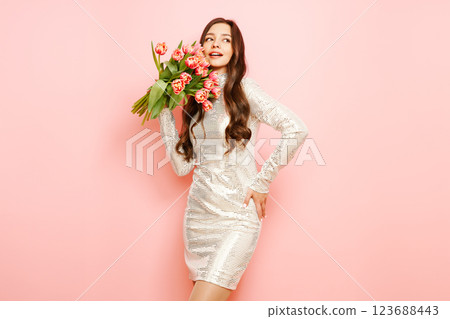Happy beauty woman with pink tulip bouquet Happy beauty woman with pink tulip bouquet 123688443