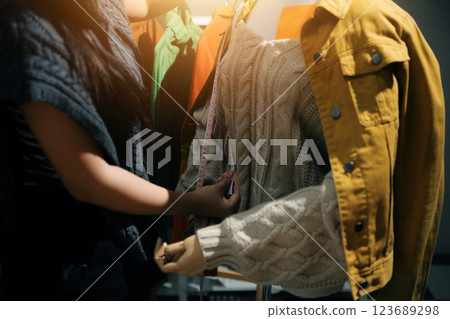 Fashion designers at work. beautiful young woman working in fashion design studio. 123689298