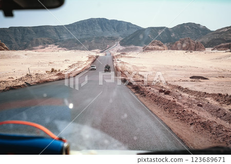 Dahab desert road in Egypt's Sinai Peninsula, view from the cabin of a jeep 123689671