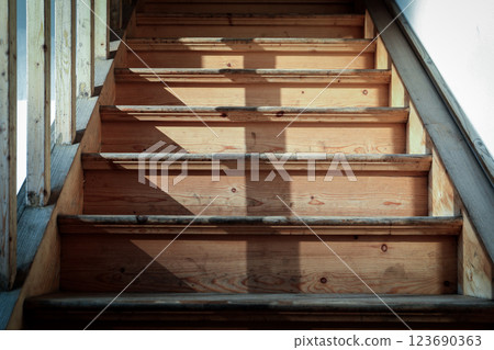 Beautiful wooden stairs. Close-up details and wood texture Beautiful wooden stairs. Close-up details and wood texture 123690363