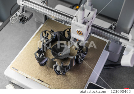 The 3D printing machine operation. The 3D rapid prototype processing concept. 123690463