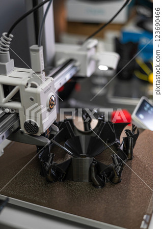 The 3D printing machine operation. The 3D rapid prototype processing concept. The 3D printing machine operation. The 3D rapid prototype processing concept. 123690466