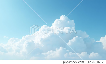 Towering white clouds under clear blue sky on sunny day. Natural cloudscape background for design, prints, and projects 123691617