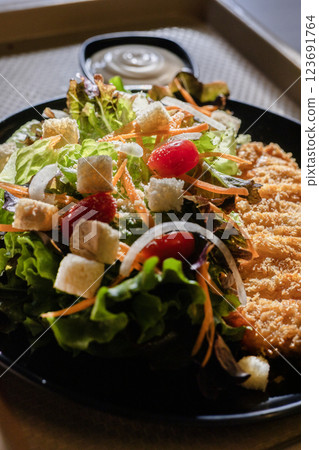Fried Pork Chop And Vegetable Salad, Background for advertising and wallpaper in food and culture scene 123691764