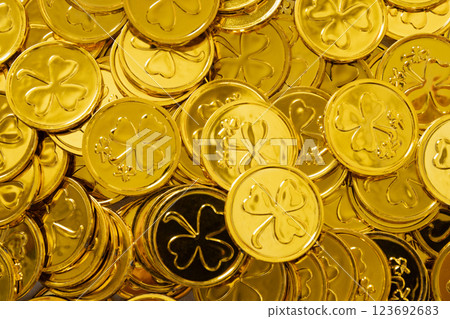 St Patrick's Day treasure concept of golden coins as background. View from above. 17 March celebration 123692683