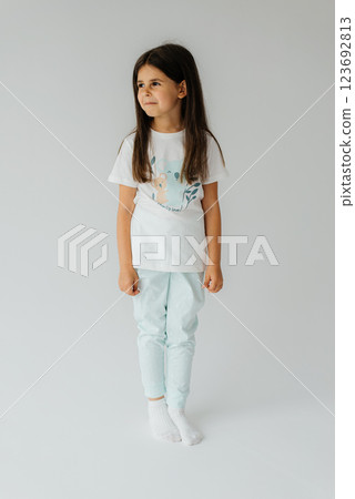 Full length photo of cute adorable small girl wear summer clothes dark eyewear smiling dancing isolated background 123692813