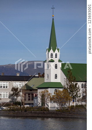 The Frikirkjan by Lake Tjornin in central Reykjavik, Iceland 123693001