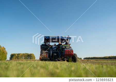 The Use of Harvesting Equipment in Action on a Productive Farm for Crop Production The Use of Harvesting Equipment in Action on a Productive Farm for Crop Production 123693823