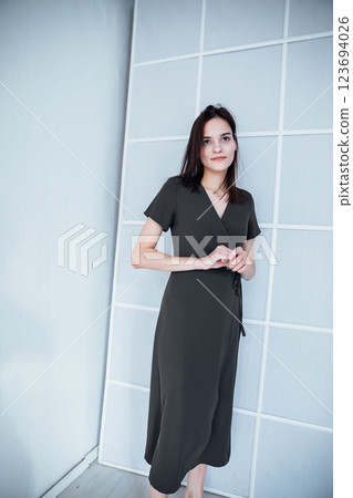 Beautiful Slim Woman in Green Summer Dress on White Background Beautiful Slim Woman in Green Summer Dress on White Background 123694026