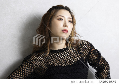 Cute woman dancing 123694625