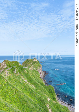 Hokkaido Shakotan Town Popular tourist attraction Kamui Cape and Kamui Cape Lighthouse in the beautiful summer with fresh greenery 123694783
