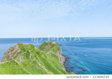 Hokkaido Shakotan Town Popular tourist attraction Kamui Cape and Kamui Cape Lighthouse in the beautiful summer with fresh greenery 123694785