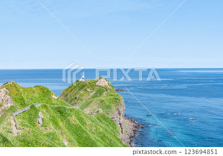 Hokkaido Shakotan Town Popular tourist attraction Kamui Cape and Kamui Cape Lighthouse in the beautiful summer with fresh greenery 123694851