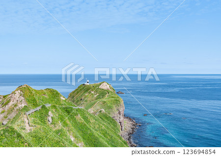 Hokkaido Shakotan Town Popular tourist attraction Kamui Cape and Kamui Cape Lighthouse in the beautiful summer with fresh greenery 123694854