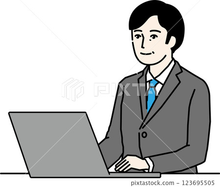穿著西裝的中年男子在電腦上工作 123695505