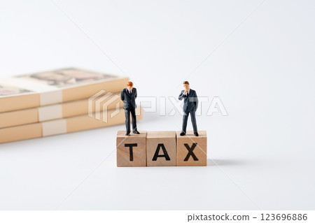 TAX businessman money 123696886