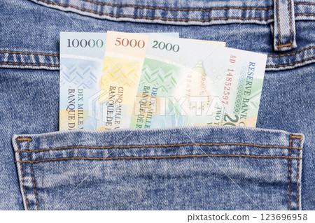 Vanuatu vatu  in the pocket of blue jeans 123696958