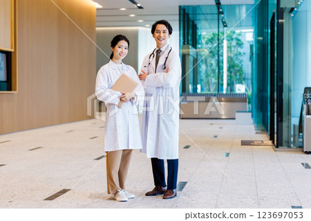 Medical team: Male and female doctors. Photo courtesy of LINK FOREST. Medical team: Male and female doctors. Photo courtesy of LINK FOREST. 123697053