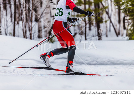 side view skier athlete participating in ski race 123697511