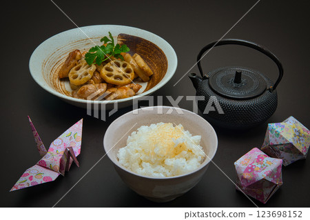 Chicken and lotus root stir-fried in sweet and sour sauce with coriander Chicken and lotus root stir-fried in sweet and sour sauce with coriander 123698152