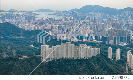 Feb 23 2022 A Buildings Overlooking Coastal Cityscape with Mountains 123698772