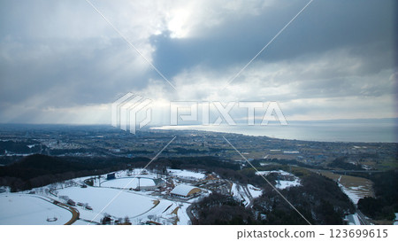 Aerial view of Uozu City, Toyama Prefecture, Japan, including the city and Toyama Bay Aerial view of Uozu City, Toyama Prefecture, Japan, including the city and Toyama Bay 123699615