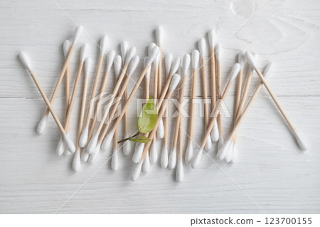 Bamboo cotton swabs on a white background. Waste-free cosmetics without the use of plastic. Eco-products. hygiene. Bamboo cotton swabs on a white background. Waste-free cosmetics without the use of plastic. Eco-products. hygiene. 123700155
