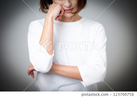 Annoyed middle woman Annoyed middle woman 123700758