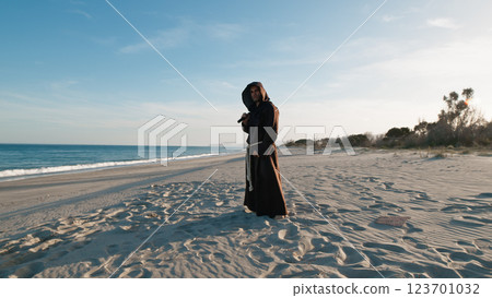Monk Practising Martial Arts With Nunchaku Monk Practising Martial Arts With Nunchaku 123701032
