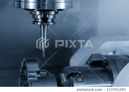 The 4-axis CNC milling machine cutting the motorcycle gear parts by solid ball nose end mill tool. The 4-axis CNC milling machine cutting the motorcycle gear parts by solid ball nose end mill tool. 123701091